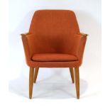 A 1960's Swedish red fabric button chair with exposed teak arms and teak tapering legs *Sold