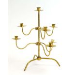 Josef Frank (1885-1967) for Svenskt Tenn, a brass seven-branch adjustable candelabrum, Model 2454,