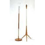 A 1960's beech and copper finished standard lamp with a tripod base,