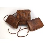 Three 1950's snakeskin handbags with rattan handles