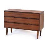 A 1960's teak cabinet, the two small drawers over two long drawers, each with a turned handle,