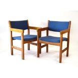 Hans Wegner for Getama, a pair of oak and upholstered armchairs,