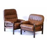 A pair of 1960's Danish high and lowback fumed oak and buffalo leather armchairs with stitched