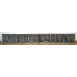 A French aluminium and perforated Cafeteria sign with relief letters in a Medieval font,