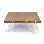 A 1970's wenge square coffee table with chromed supports, retailed by Conran, w.