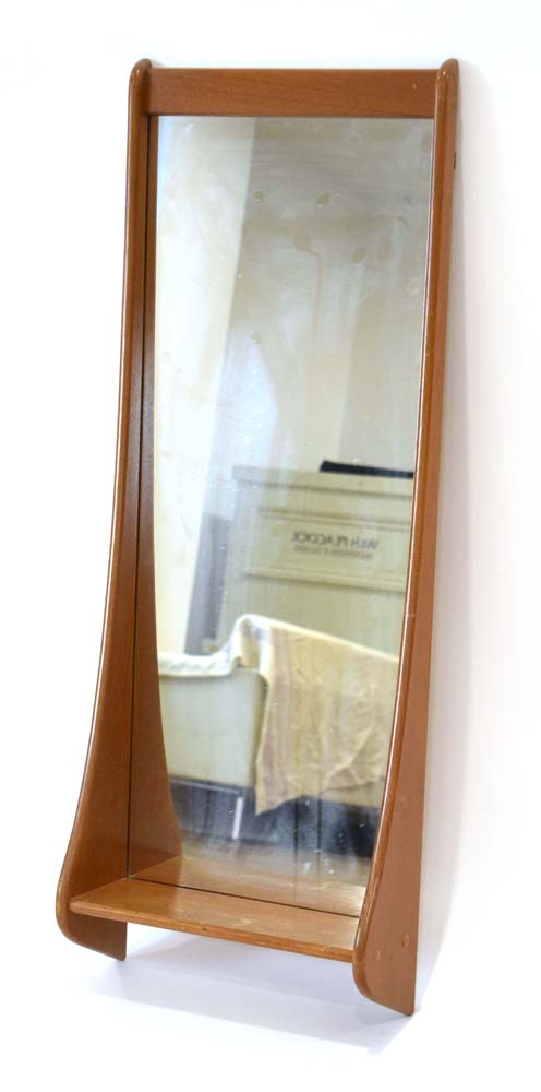 A 1960/70's teak wall mirror with an integral shelf, in the manner of Pedersen and Hansen, h.