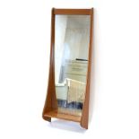 A 1960/70's teak wall mirror with an integral shelf, in the manner of Pedersen and Hansen, h.