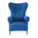 A 1950/60's button upholstered striped wingback armchair on tapering legs *Sold Subject to our