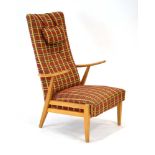 A 1950/60's Swedish beech highback armchair with button upholstery and a fitted headrest *Sold