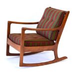 A 1970's beech rocking chair with loose upholstery in the manner of Ole Wanscher *Sold Subject to