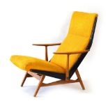 A 1958 Swedish armchair of angular form with yellow upholstery and a beech and ebonised frame by