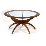 Victor Wilkins for G-Plan, a 'Spider' table with a glazed insert and teak supports, d.