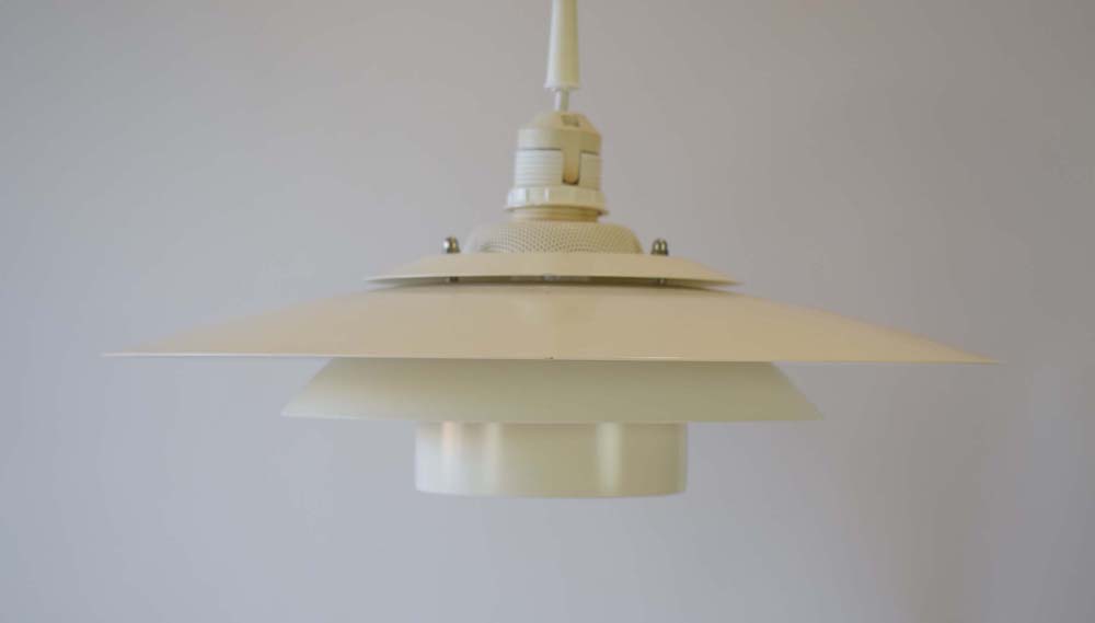 A Danulight Korfu white enamelled three-tier ceiling light CONDITION REPORT: Working