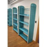 A pair of 1980's green perforated shelving units CONDITION REPORT: Height 195 cm.