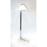 A 1970's chromed and white enamelled standard lamp with a flexible shade CONDITION