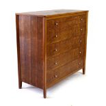 A Gordon Russell walnut chest of five long drawers,