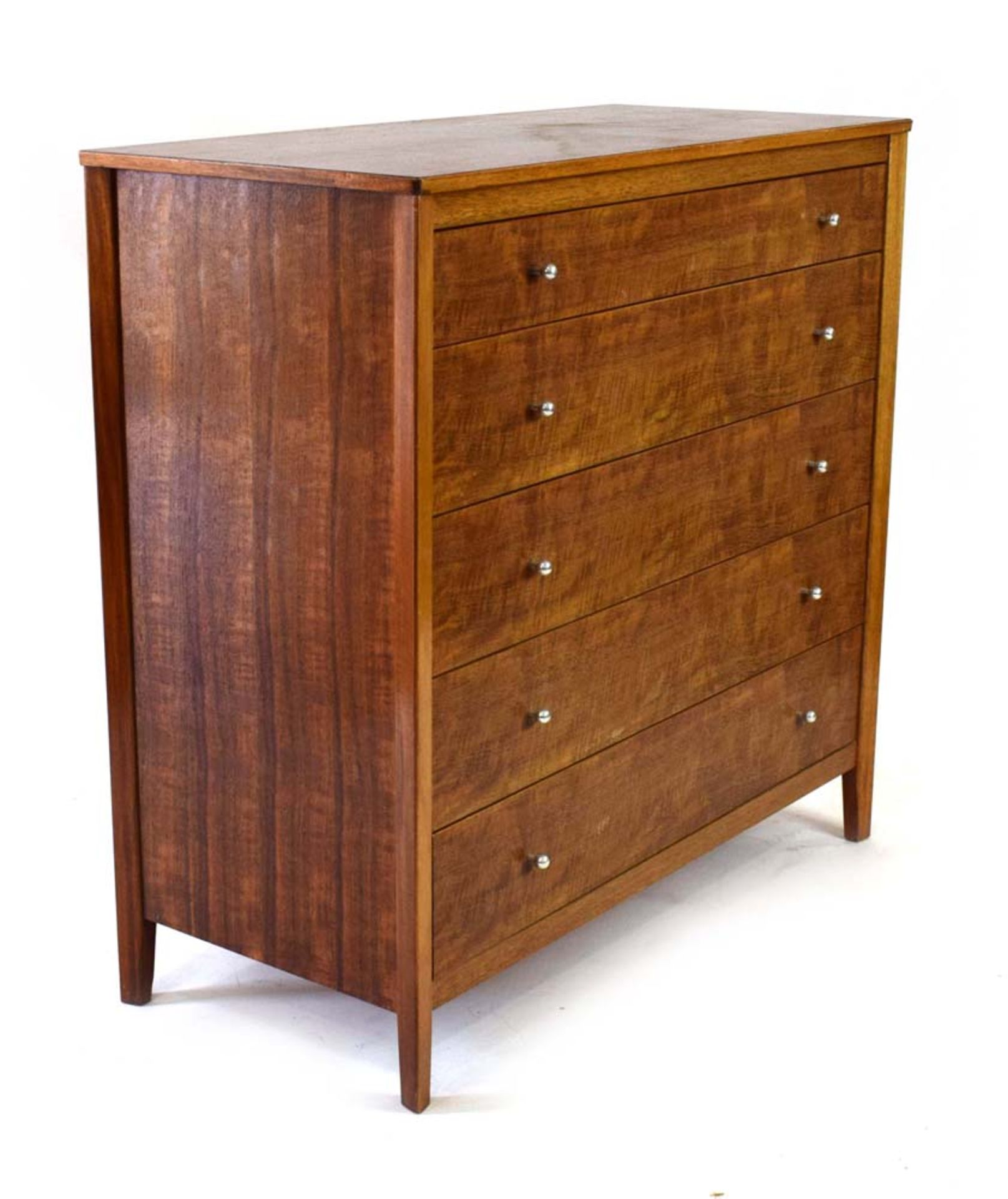 A Gordon Russell walnut chest of five long drawers,