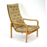 A 1960's Scandinavian oak and bentwood armchair with loose button upholstery *Sold Subject to our