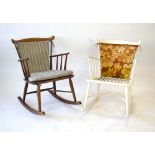 A pair of Danish beech spindle back rocking chairs with loose upholstery by Farstrup *Sold