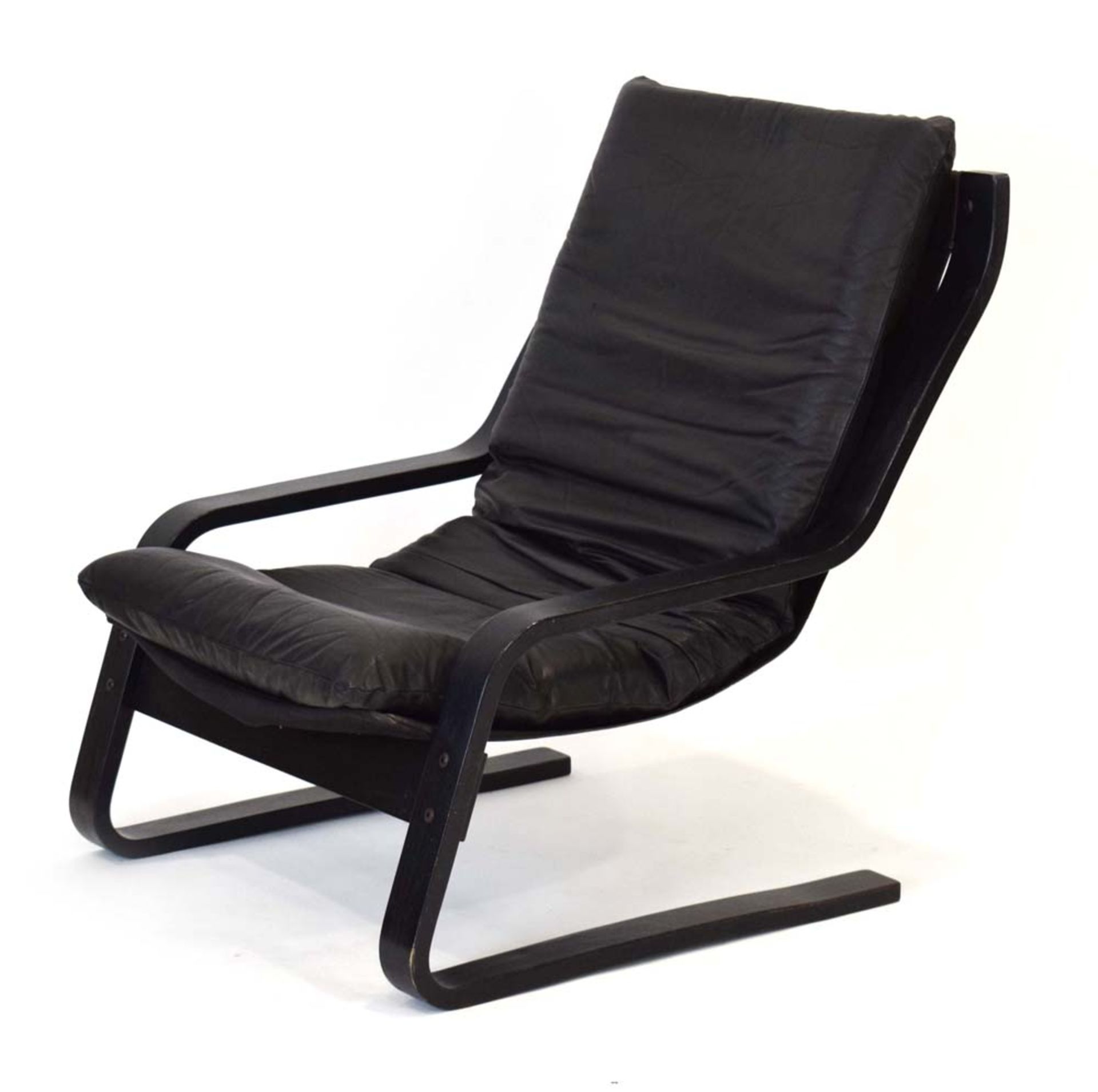 A 1970's armchair, the leather cushion on a black ash bentwood frame, in the manner of Alvar Aalto, - Image 2 of 10