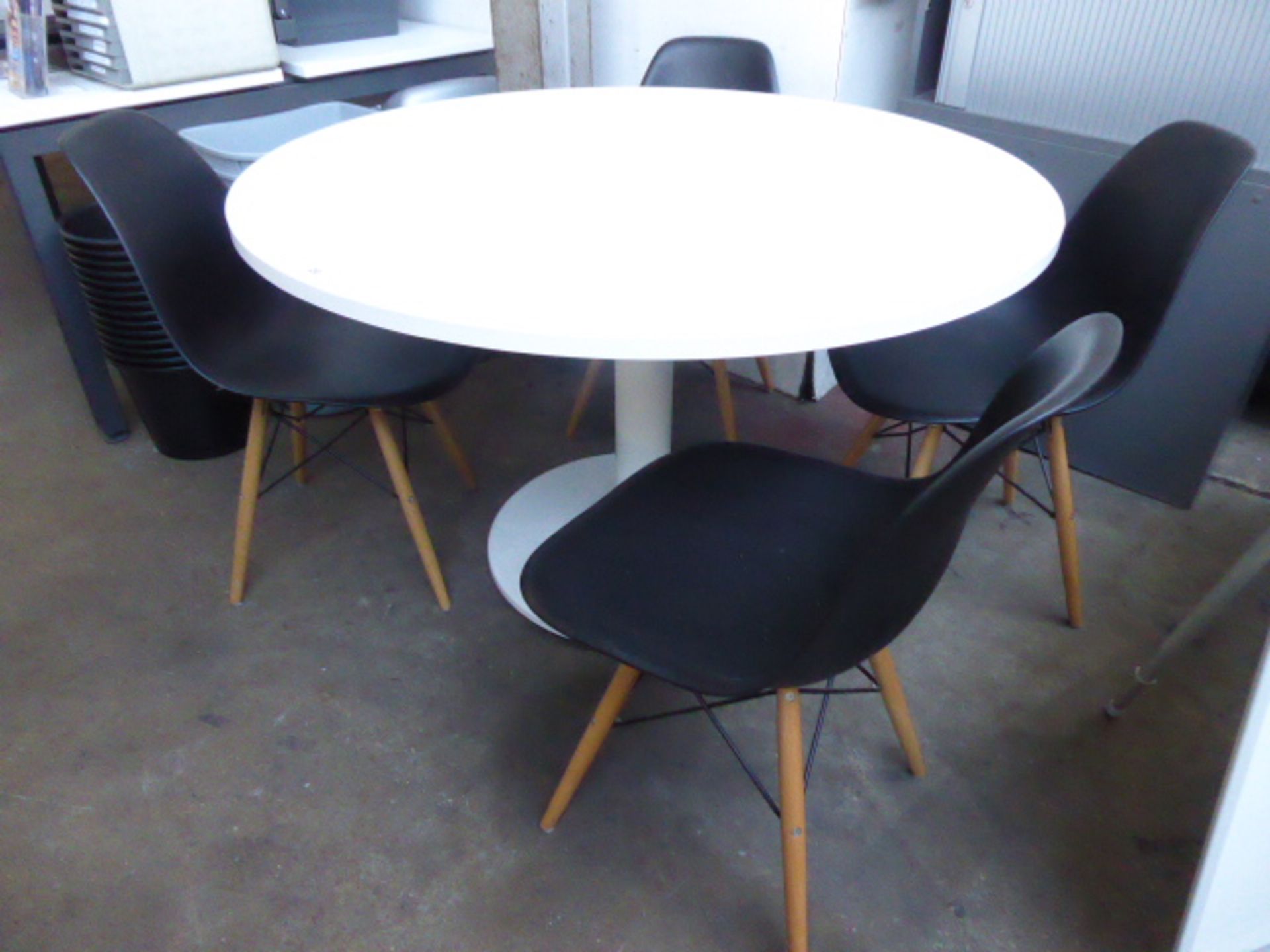 120cm diameter white circular top table on single pedestal with 4 matching designer inspired chairs