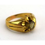 A gents 9ct yellow gold gypsy ring set smoky quartz in a six claw setting, London 1975,