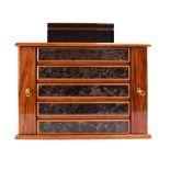 An Osvaldo Agresti Italian lacquered wood Wellington-type jewellery cabinet of five drawers and two