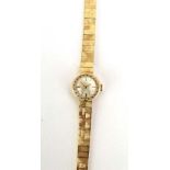 A ladies 9ct yellow gold manual wind wristwatch by Eterna,