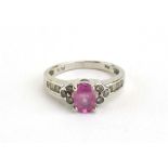 A 14ct white gold ring set oval (?)pink sapphire and small diamonds, ring size M, 3.