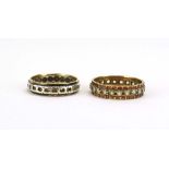 Two 9ct yellow gold full eternity rings set paste, various sizes, overall 5.