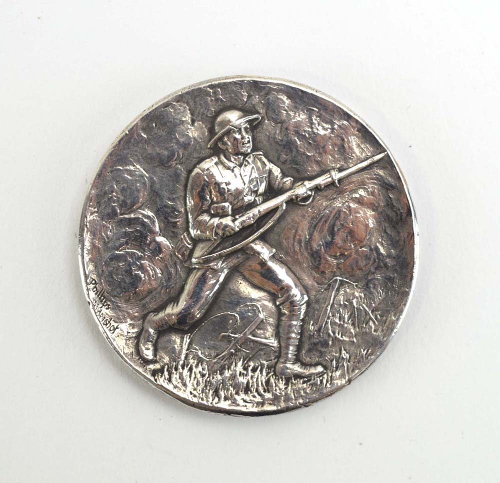 A Hampshire Regiment silver medallion by Phillipps of Aldershot awarded as a 'Platoon Efficiency