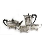 A silver four piece tea service of canted vase shaped form, maker K Ltd.