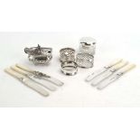 A mixed parcel of silver comprising: three napkin rings,