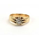 A 9ct yellow gold ring set brilliant cut diamond in an illusion ten claw setting, London 1974,