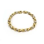 A 9ct yellow gold articulated x-link bracelet with lobster clasp, l. 18.5 cm, 10.