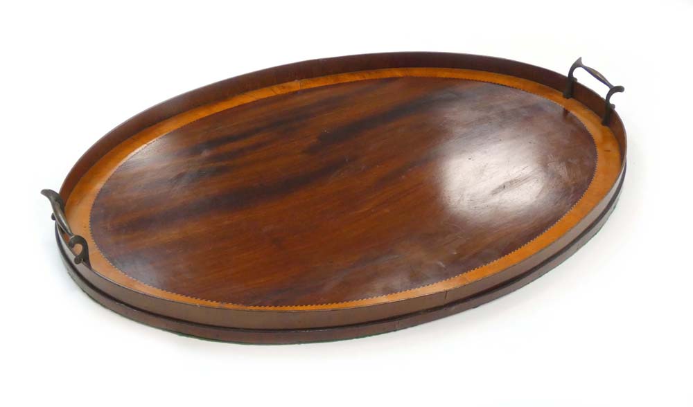 A 19th century mahogany and satinwood crossbanded tray of oval form, w.