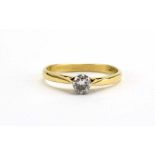 An 18ct yellow gold ring set brilliant cut diamond in an eight claw setting, stone approximately 0.