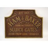 A reproduction sign for Ham & Baker, Manufacturers of Sluice Gates, Grand Union Canal- River Lea,