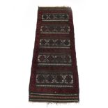 An Afghan runner with a deep purple ground, 185 x 65 cm, together with a later kilim,