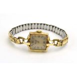 A ladies gold plated manual-wind wristwatch by Longines,