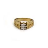 A 9ct yellow gold ring set small diamond in an illusion setting,