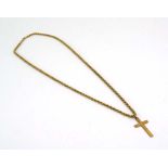 A 9ct yellow gold ropetwist necklace suspending a 9ct yellow gold cross pendant,