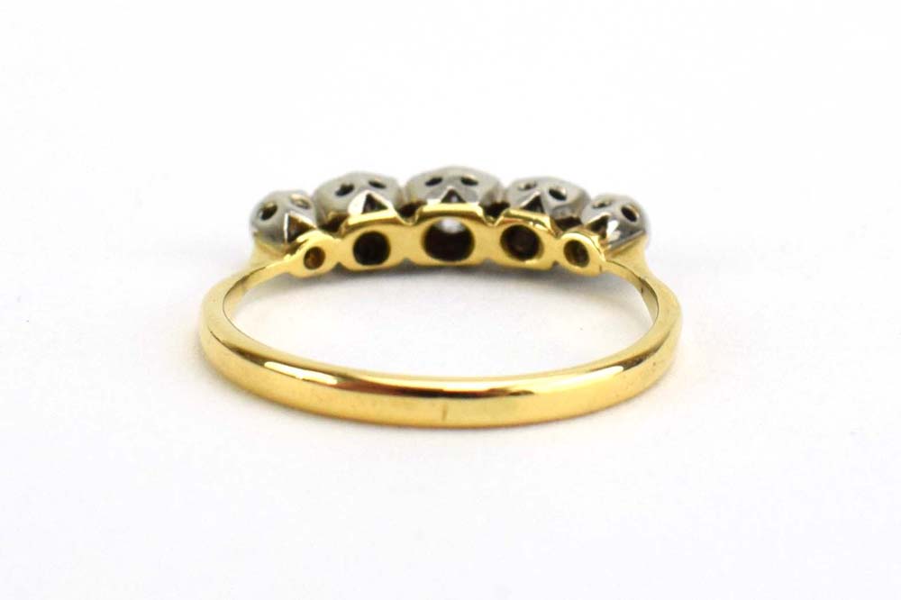 An 18ct yellow gold ring set five graduated diamonds in illusion settings, ring size O, 2. - Image 3 of 4
