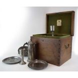 A 19th century oak and brass mounted case containing Puckeridge Chapel communion pewter, dated 1832,