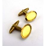 A pair of 9ct yellow gold cufflink's of oval form, overall 8.