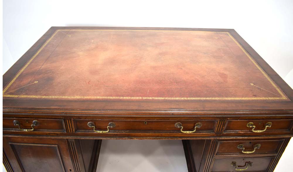 A late 19th/early 20th century mahogany and tooled leather partner's desk on plinth bases, - Image 3 of 3