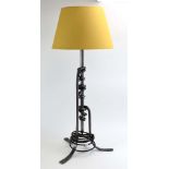 A Belltrees Forge desk lamp with a rustic swirled metal body, h.