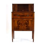 A 19th century flame mahogany, crossbanded and strung secretaire,
