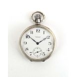 A silver open face pocket watch by Waltham,