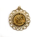 A 9ct yellow gold pendant set a sovereign dated 1967 in a loose mount, overall 14.